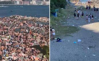 Napoli assalto alle spiagge prima la folla poi i rifiuti Video Napoli assalto alle spiagge prima la folla poi i rifiuti Video